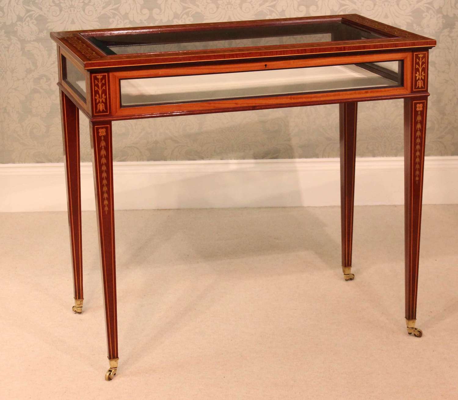 An Edwards & Roberts Late Victorian Mahogany Inlaid Rectangular Table