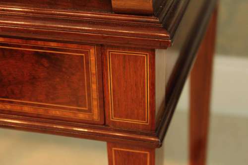A Beautiful Late Victorian Mahogany cylinder desk by Maple & Co.