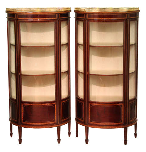A Pair of Edwardian Inlaid Bow-front Glazed Display Cabinets