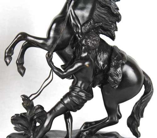 A fine pair of 19th Century Bronze Marley horses with figures.
