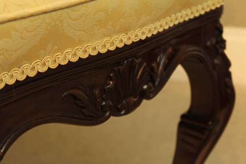 A mahogany Late Victorian Period stool by Edwards & Roberts of London.