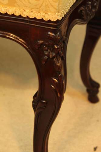 A mahogany Late Victorian Period stool by Edwards & Roberts of London.