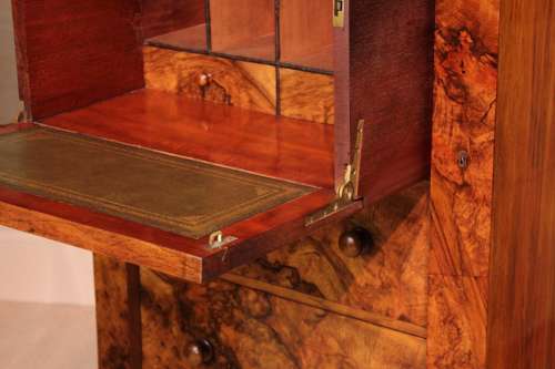 A Victorian Figured Burr Walnut Secretaire Wellington Chest