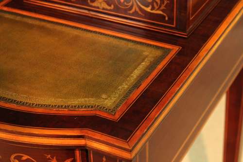 A Late Victorian Mahogany Inlaid Carleton House Style Desk
