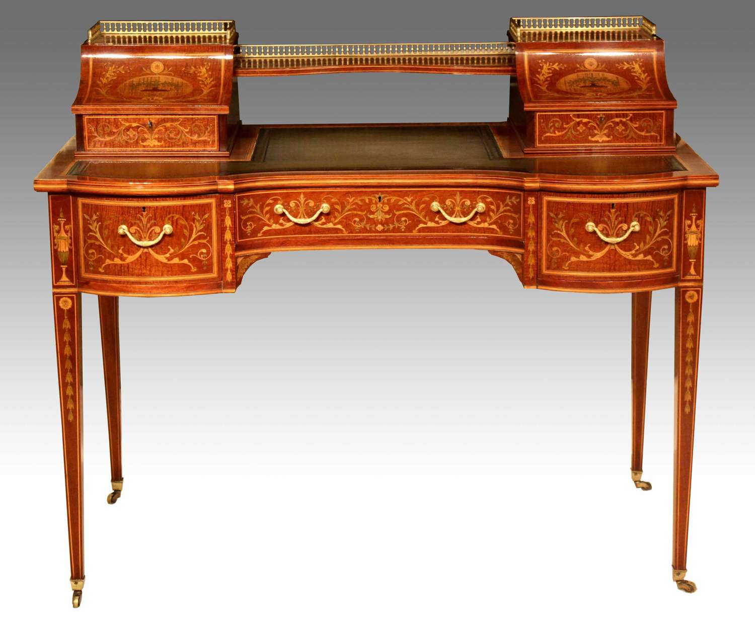 A Late Victorian Mahogany Inlaid Carleton House Style Desk