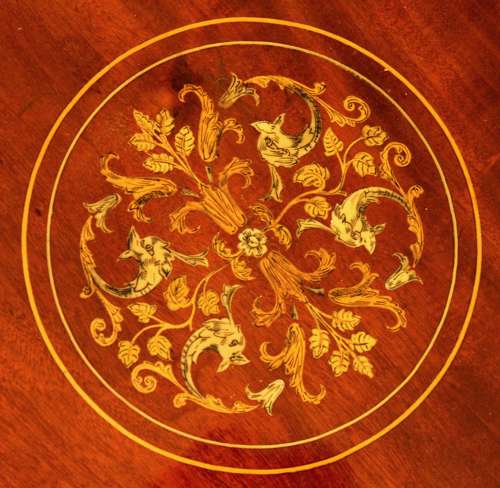 A Late Victorian Mahogany inlaid revolving bookcase by Maple & Co