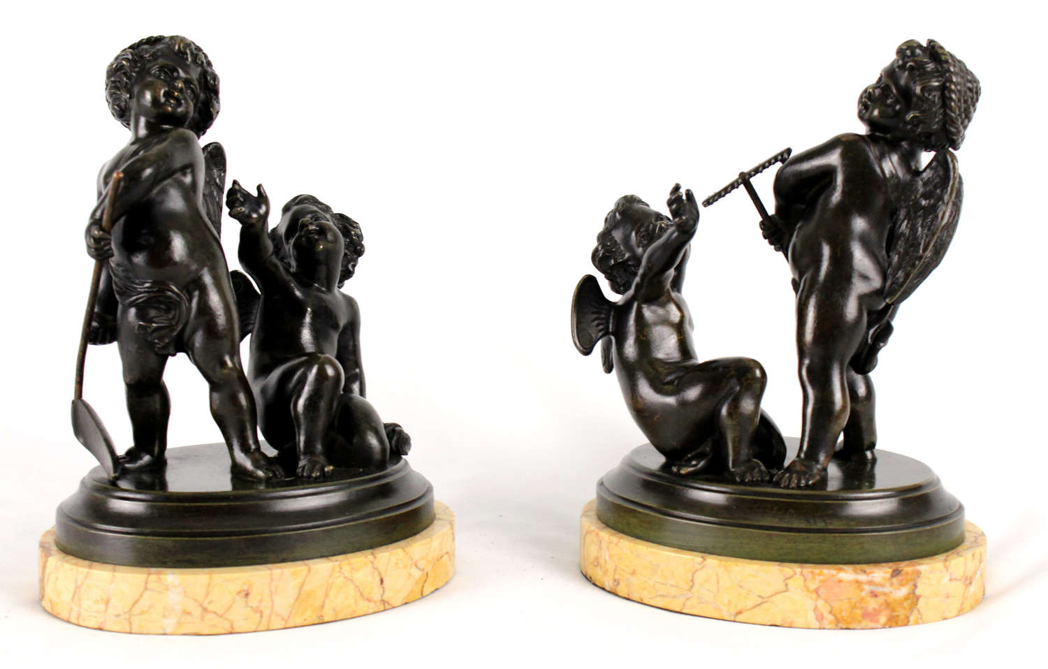 A Pair Of 19th Century French Bronze Figures Of Cherub Farmers
