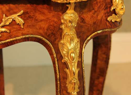 A Victorian Burr Walnut Inlaid and Ormolu Mounted Table