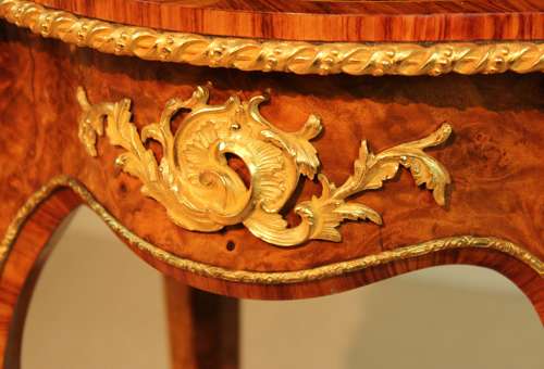 A Victorian Burr Walnut Inlaid and Ormolu Mounted Table