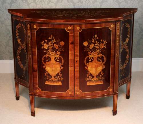 A Superb Late Victorian Mahogany Inlaid Serpentine Commode
