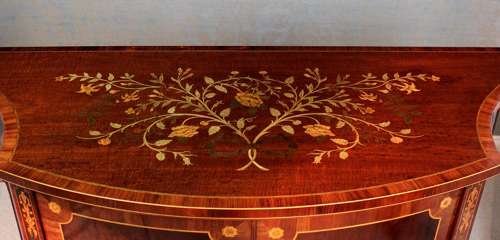 A Superb Late Victorian Mahogany Inlaid Serpentine Commode