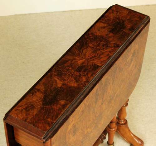 A Superb Victorian Burr Walnut D-Ended Baby Sutherland Table