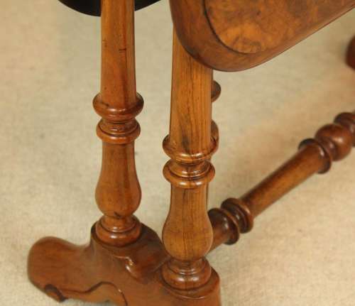 A Superb Victorian Burr Walnut D-Ended Baby Sutherland Table