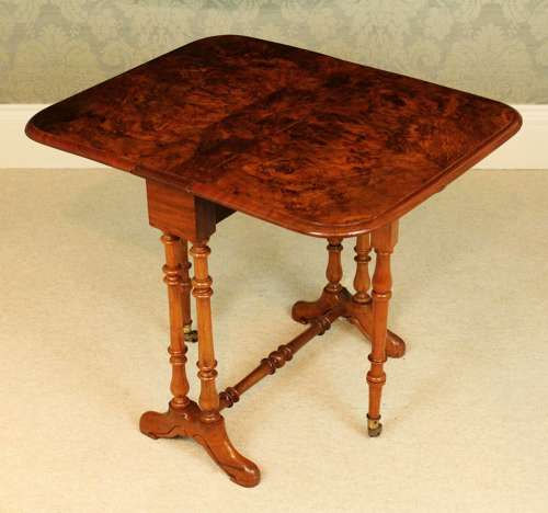 A Superb Victorian Burr Walnut D-Ended Baby Sutherland Table