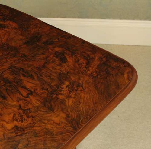 A Superb Victorian Burr Walnut D-Ended Baby Sutherland Table