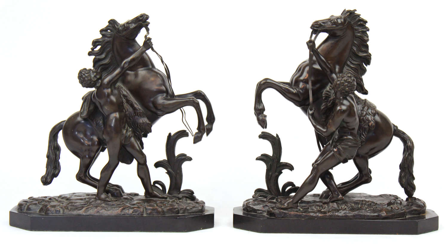 A fine pair of 19th Century Bronze Marley horses with figures.
