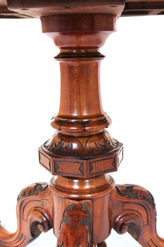 A Victorian Inlaid and Carved Walnut Drum Table