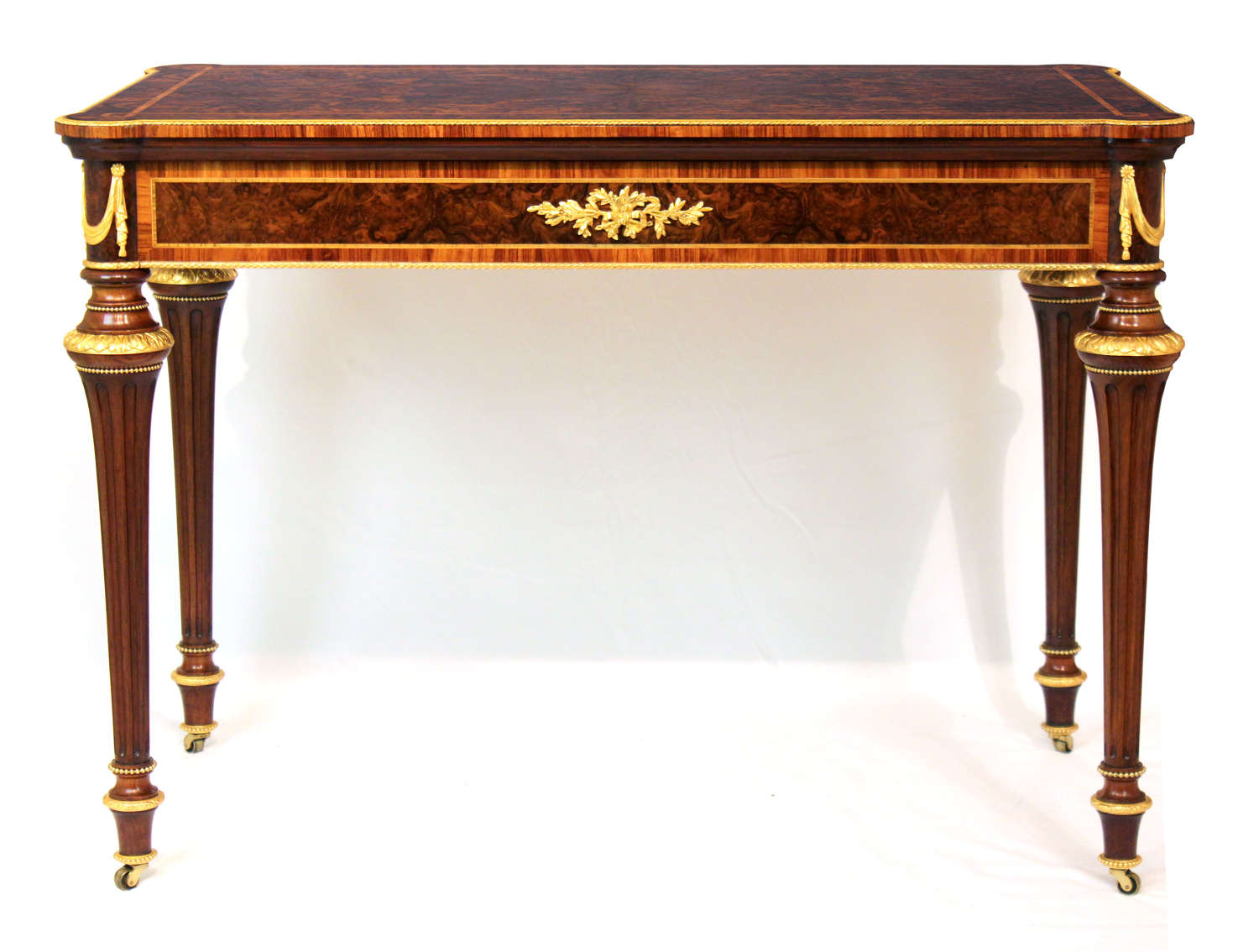 An Exceptional Walnut Inlaid and Ormolu Mounted Card Table