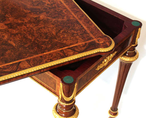 An Exceptional Walnut Inlaid and Ormolu Mounted Card Table