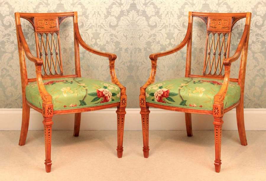 An Elegant Pair of Painted and Carved Satinwood Side Chairs