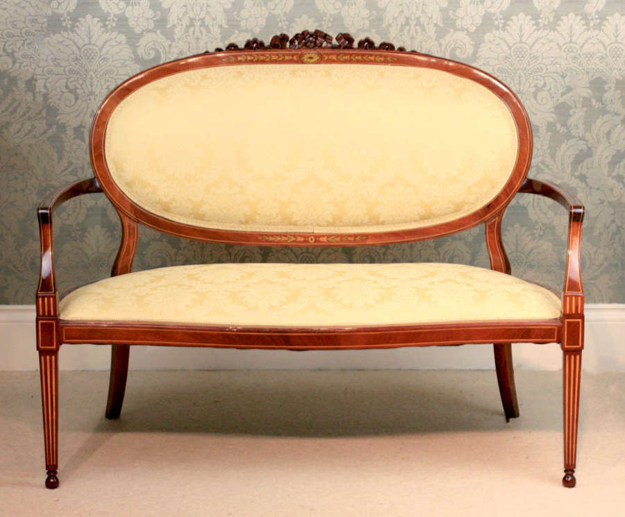 A Fine Carved Late Victorian Mahogany Inlaid Upholstered Settee