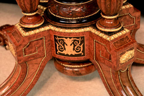 A Gillows Victorian Burr-walnut and Amboyna Mounted Centre Table