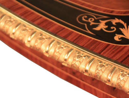 A Gillows Victorian Burr-walnut and Amboyna Mounted Centre Table