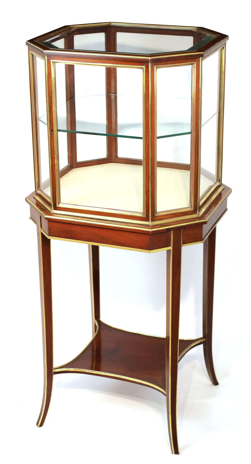 A Quality Victorian Mahogany Brass Bound Tiered Canted Display Cabinet