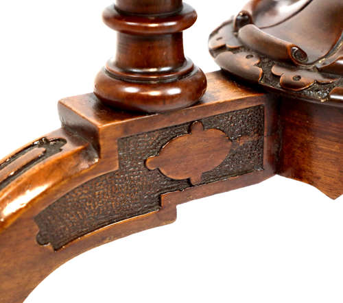 A Victorian Walnut Circular Work Table in the Manner of Gillows