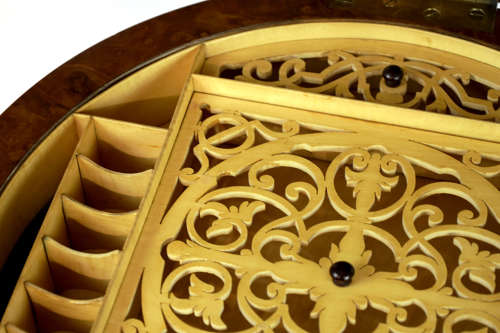 A Victorian Walnut Circular Work Table in the Manner of Gillows
