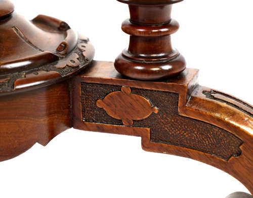 A Victorian Walnut Circular Work Table in the Manner of Gillows