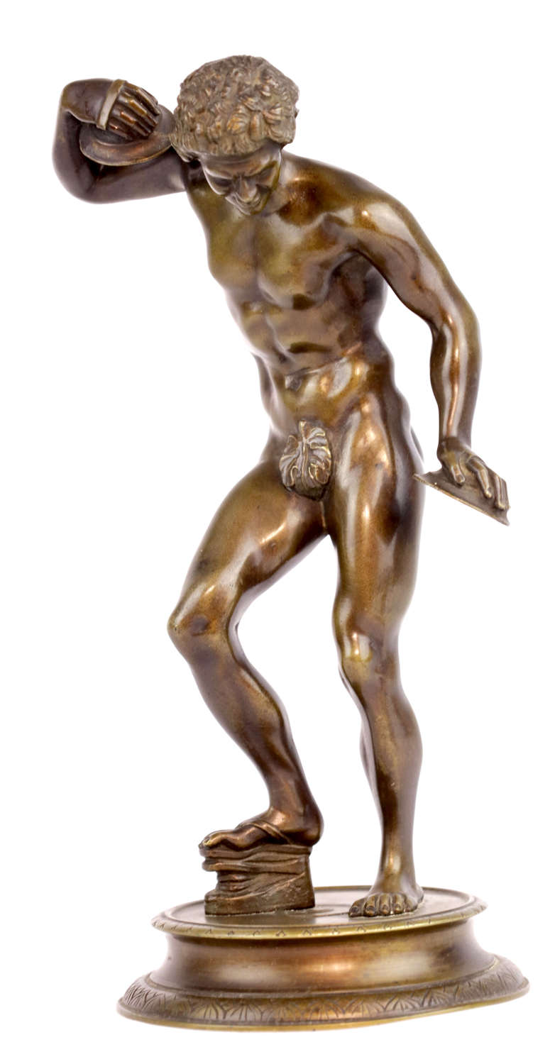 A 19th Century Grand Tour Bronze Of A Dancing Faun Holding Cymbals