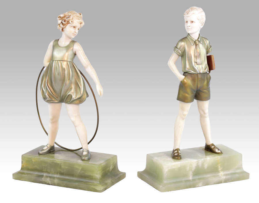Ferdinand Preiss - A Pair of Art Deco Ivory and Bronze Figures