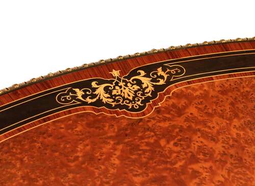 Att Gillows, A Victorian Burr Walnut And Amboyna Mounted Centre Table