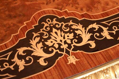 Att Gillows, A Victorian Burr Walnut And Amboyna Mounted Centre Table