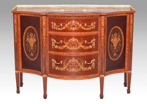 A Superb Late Victorian Mahogany Inlaid Serpentine Commode