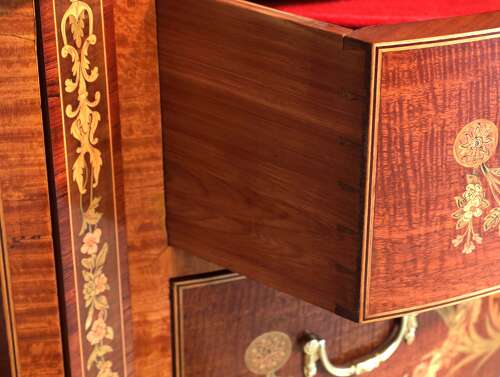 A Superb Late Victorian Mahogany Inlaid Serpentine Commode