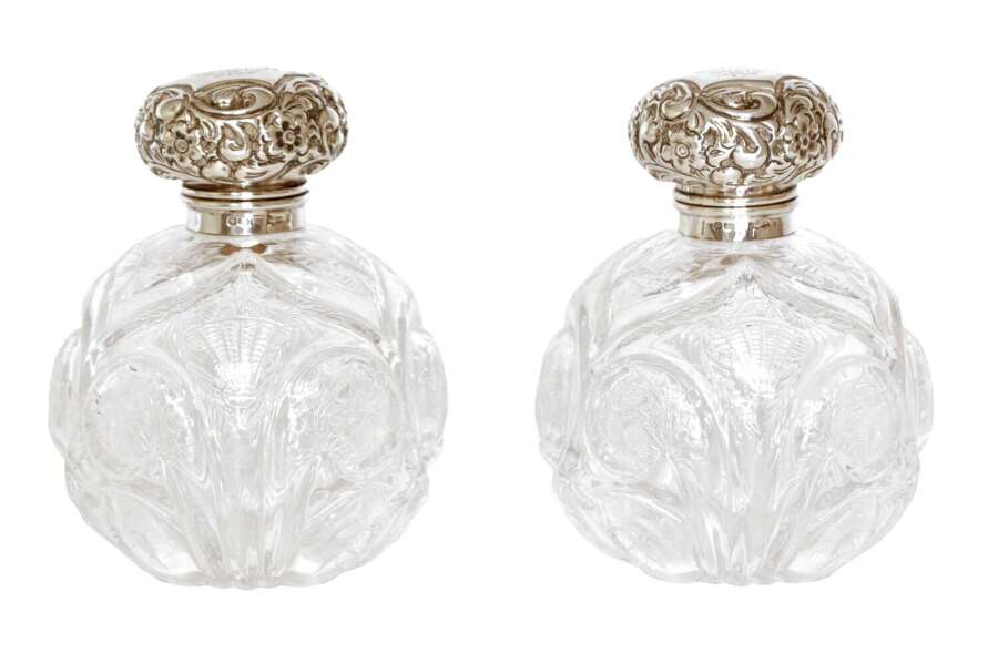 A Pair of Early 20th Century Silver Mounted Cut Glass Perfume Globular Bottles