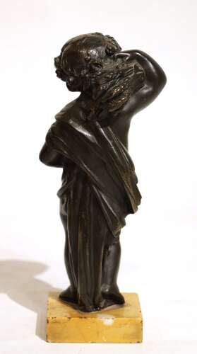A Pair Of Victorian Bronze and Sienna Marble Harvest Putti Sculptures